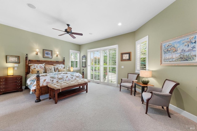 carpeted bedroom featuring access to outside and ceiling fan