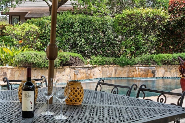 view of patio featuring an empty pool