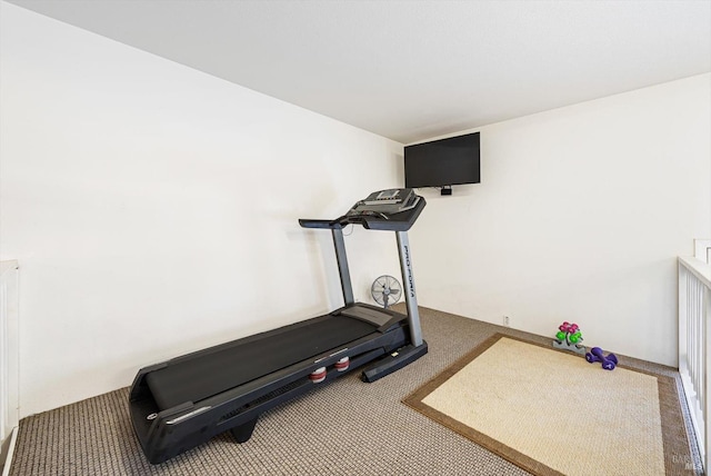 exercise room with carpet floors