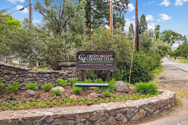 view of community sign