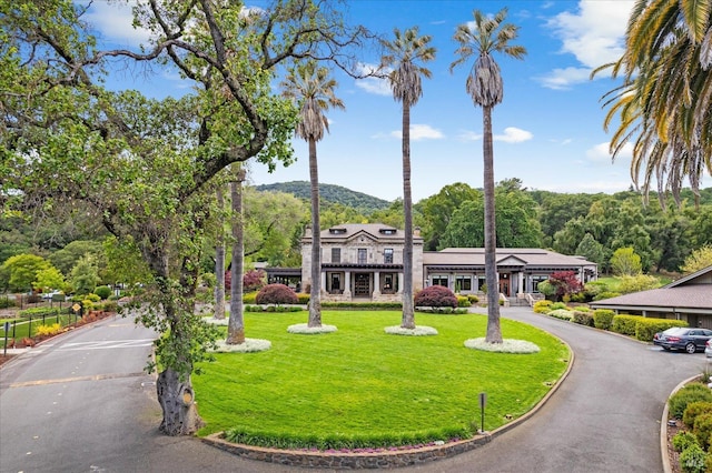 view of front of home with a front yard