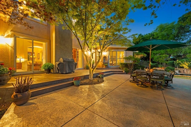 view of patio with a grill