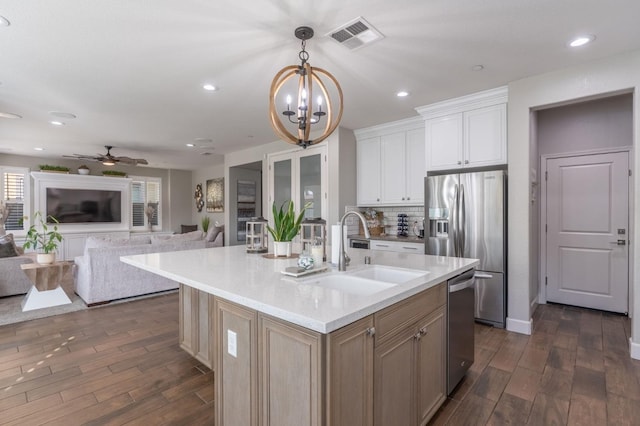 2640 Buttercup Dr, Lodi, CA 95242 - kitchen with a sink, stainless steel appliances, dark wood-type flooring, open floor plan, and recessed lighting