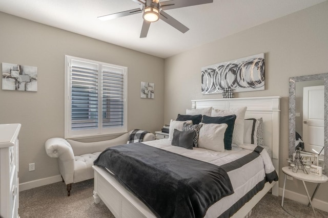 carpeted bedroom with baseboards and ceiling fan