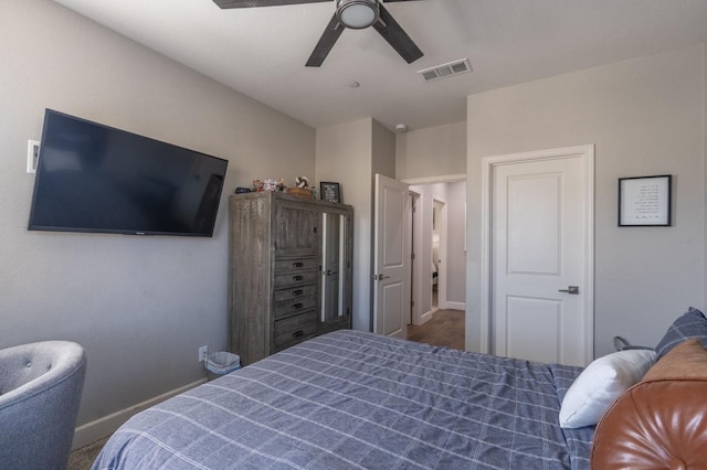 bedroom with visible vents, a ceiling fan, and baseboards