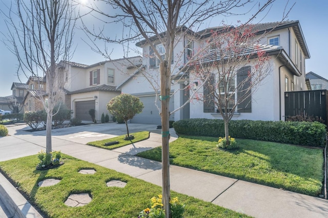 view of front of home with a front lawn, a residential view, driveway, and stucco siding