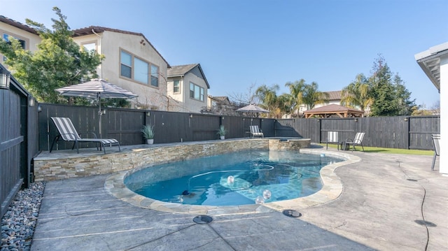 2640 Buttercup Dr, Lodi, CA 95242 - view of swimming pool featuring a fenced backyard, a patio, and a pool with connected hot tub