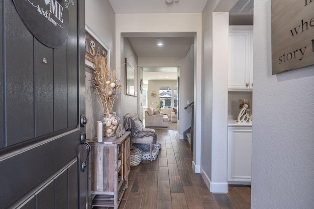 2640 Buttercup Dr, Lodi, CA 95242 - hall featuring dark wood-style floors and baseboards