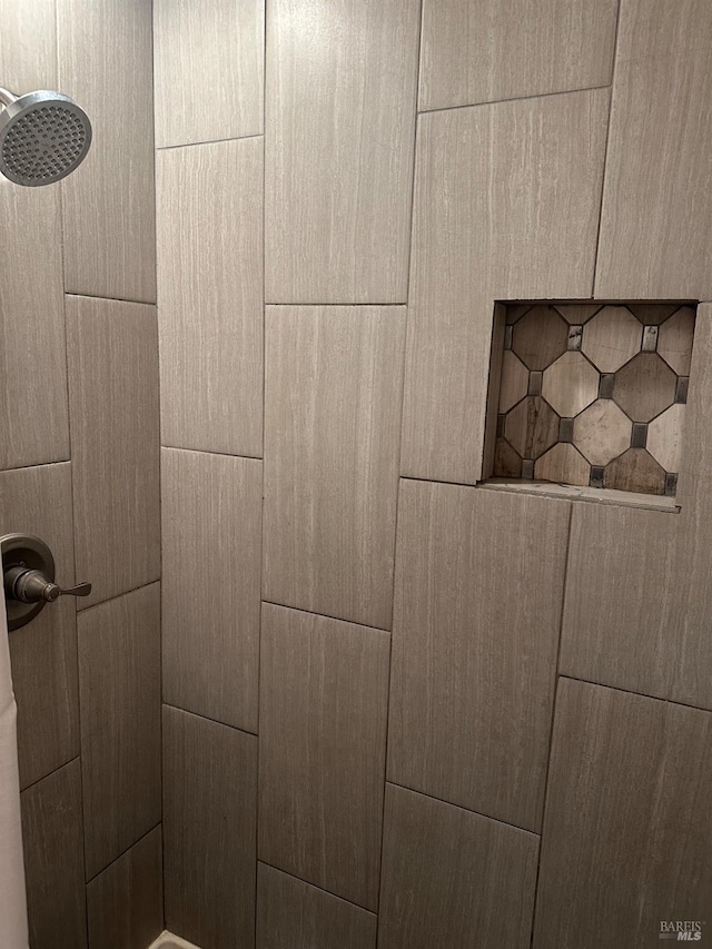 interior details with a shower