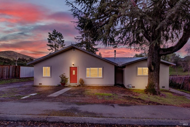 single story home featuring a mountain view