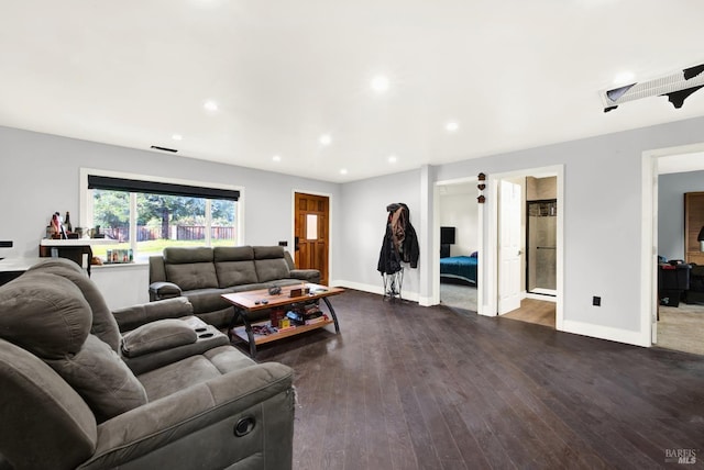 living room featuring dark hardwood / wood-style floors