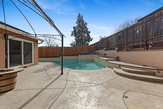 view of pool with a patio area