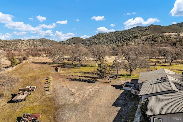 view of mountain feature with a rural view