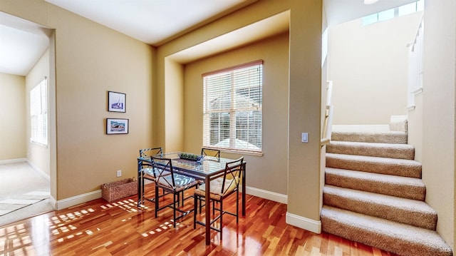 dining space featuring hardwood / wood-style floors