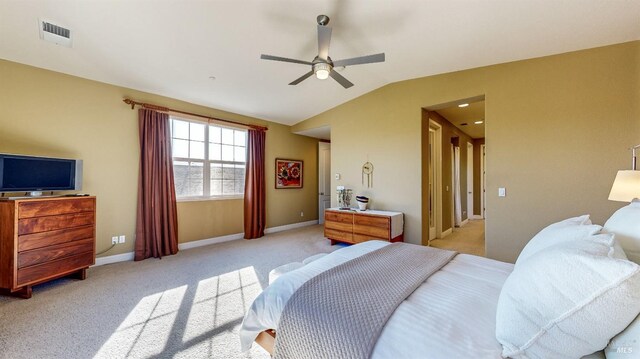 bedroom with lofted ceiling, light carpet, and ceiling fan