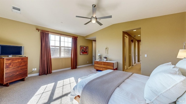 bedroom with light colored carpet, visible vents, a ceiling fan, vaulted ceiling, and baseboards