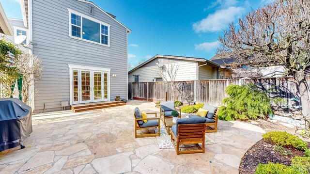 view of patio / terrace with a grill and an outdoor hangout area