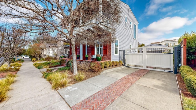 view of property exterior featuring a gate