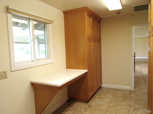 mudroom featuring light tile patterned floors