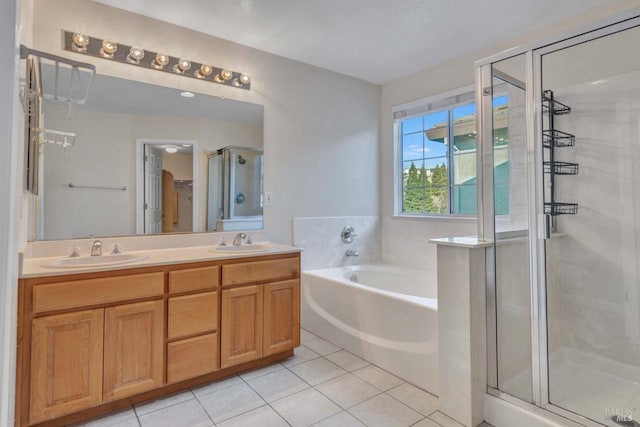 bathroom with tile patterned flooring, plus walk in shower, and vanity