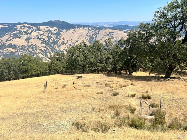 mountain view featuring a rural view