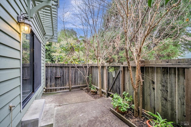 view of patio featuring a fenced backyard