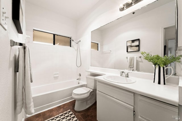 full bathroom with  shower combination, toilet, tile patterned flooring, and vanity