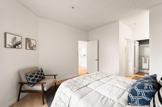 bedroom featuring hardwood / wood-style flooring