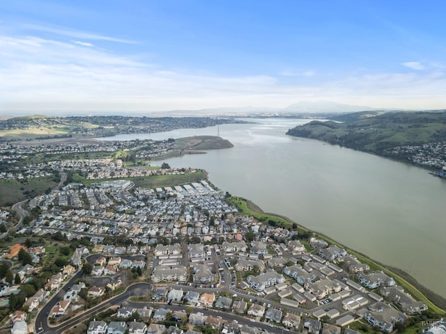 drone / aerial view with a water view