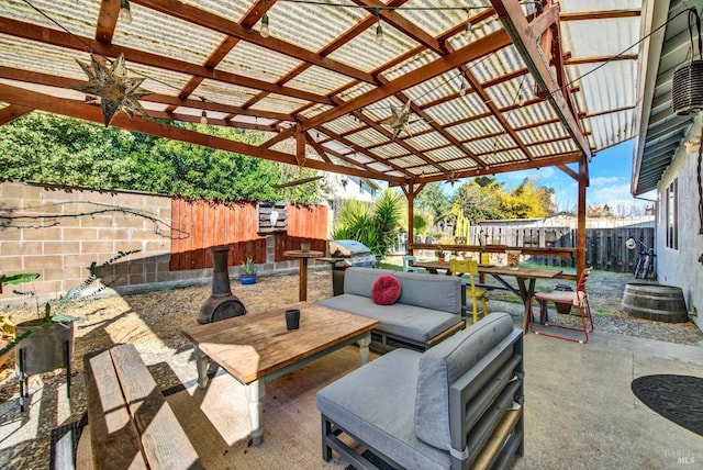 view of patio featuring outdoor lounge area, area for grilling, and a pergola