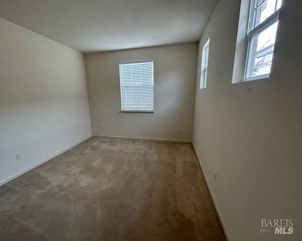 view of carpeted spare room