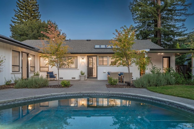 back of house featuring a patio area