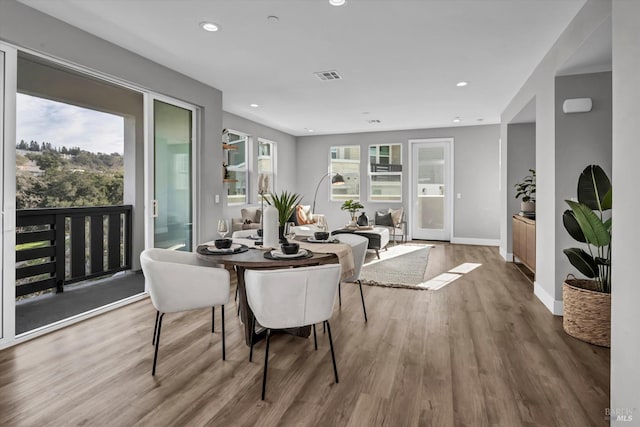 dining room featuring hardwood / wood-style flooring