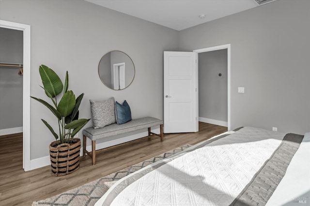 bedroom featuring hardwood / wood-style flooring