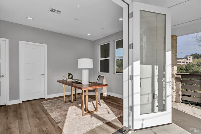 office with hardwood / wood-style floors