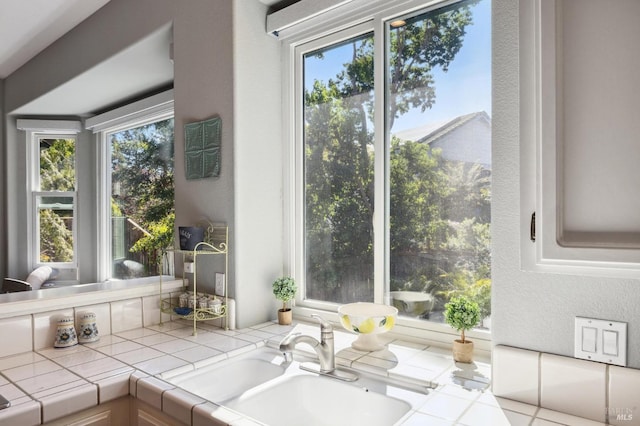 room details with sink and tile countertops