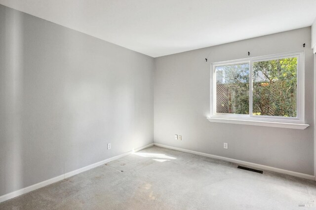 spare room with carpet flooring