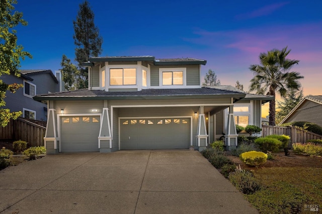 view of front of home with a garage