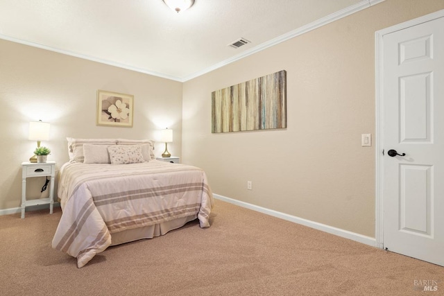 bedroom featuring ornamental molding and carpet floors