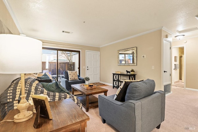 living room featuring ornamental molding, light carpet, and a textured ceiling