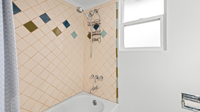 bathroom featuring shower / bath combo with shower curtain