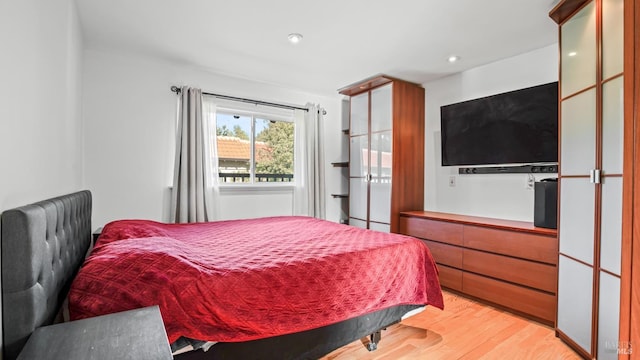 bedroom featuring light hardwood / wood-style flooring