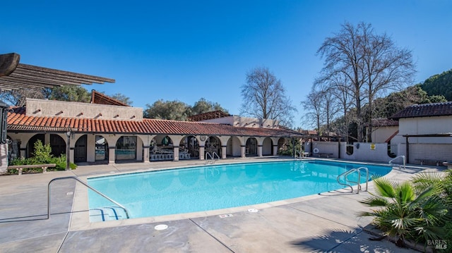 view of pool with a patio