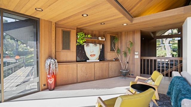 sunroom / solarium with wood ceiling and plenty of natural light