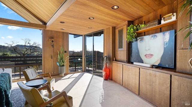 interior space featuring wooden ceiling