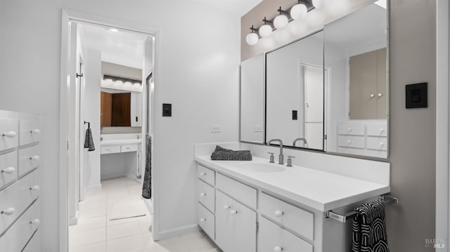 bathroom with vanity and tile patterned flooring