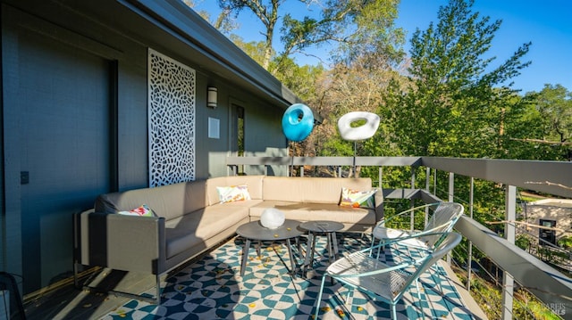 balcony featuring an outdoor living space