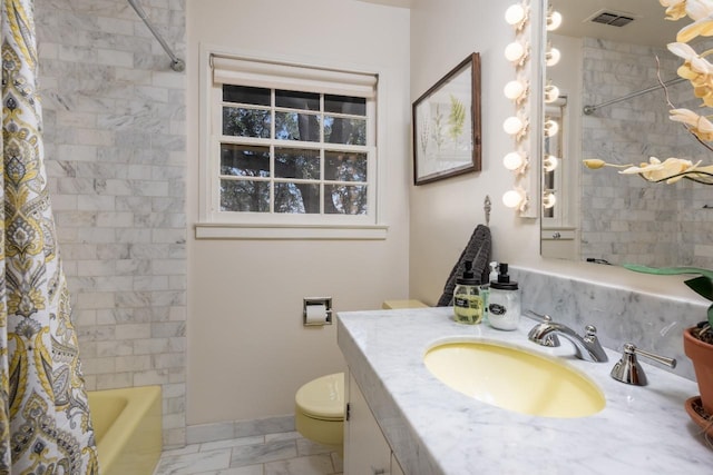 bathroom with visible vents, shower / tub combo with curtain, marble finish floor, toilet, and vanity