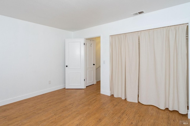 unfurnished bedroom featuring light hardwood / wood-style flooring