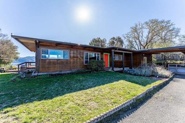 ranch-style house with a front yard